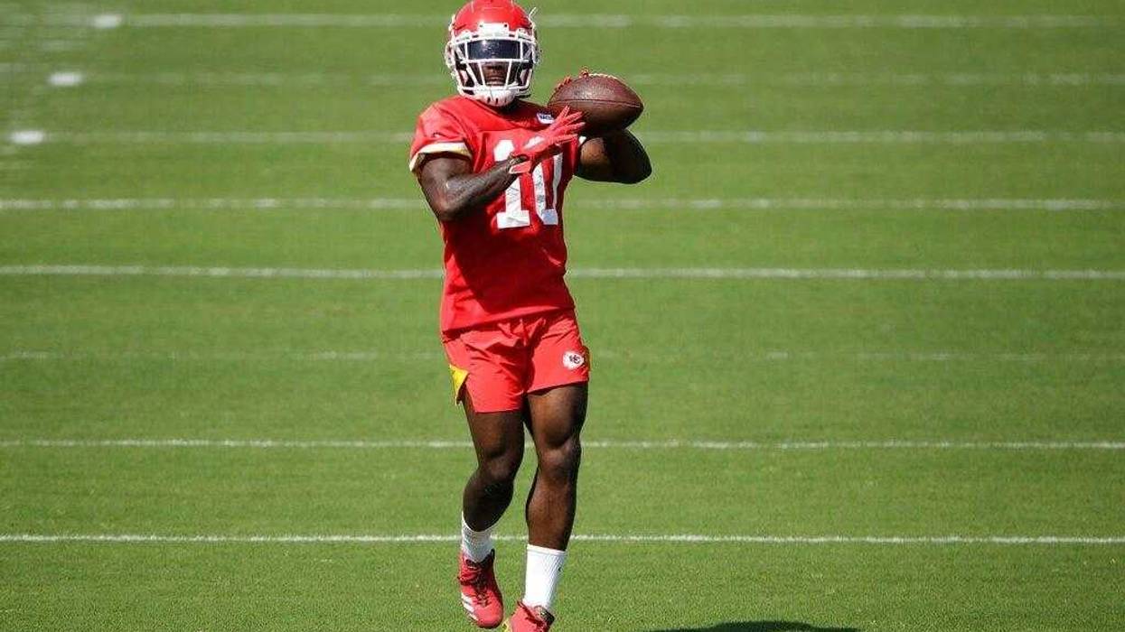 Kansas City Chiefs wide receiver Tyreek Hill throws the ball during NFL football training camp Saturday, July 27, 2019, in St. Joseph, Mo.