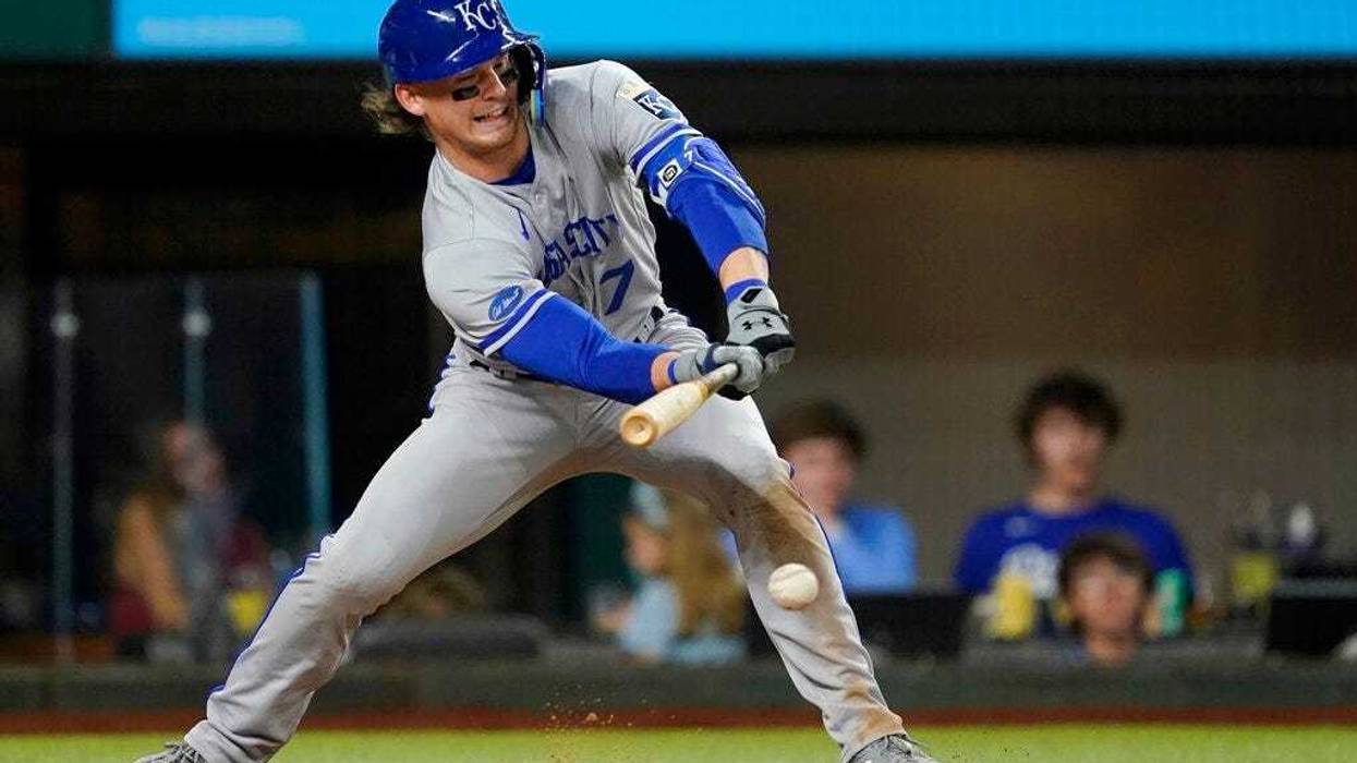 Kansas City Royals' Bobby Witt Jr. connects for a fielders choice in the seventh inning