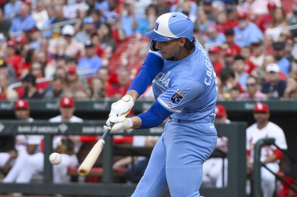 Kansas City Royals designated hitter Jac Caglianone (14) bats against the St. Louis Cardinals during the second inning of his Major League Baseball debut at Busch Stadium.