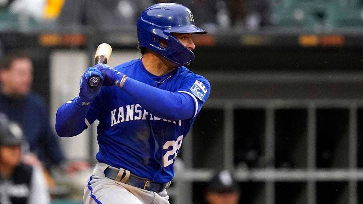 Kansas City Royals' Kyle Isbel watches his two-run single off Chicago White Sox relief pitcher Aaron Bummer