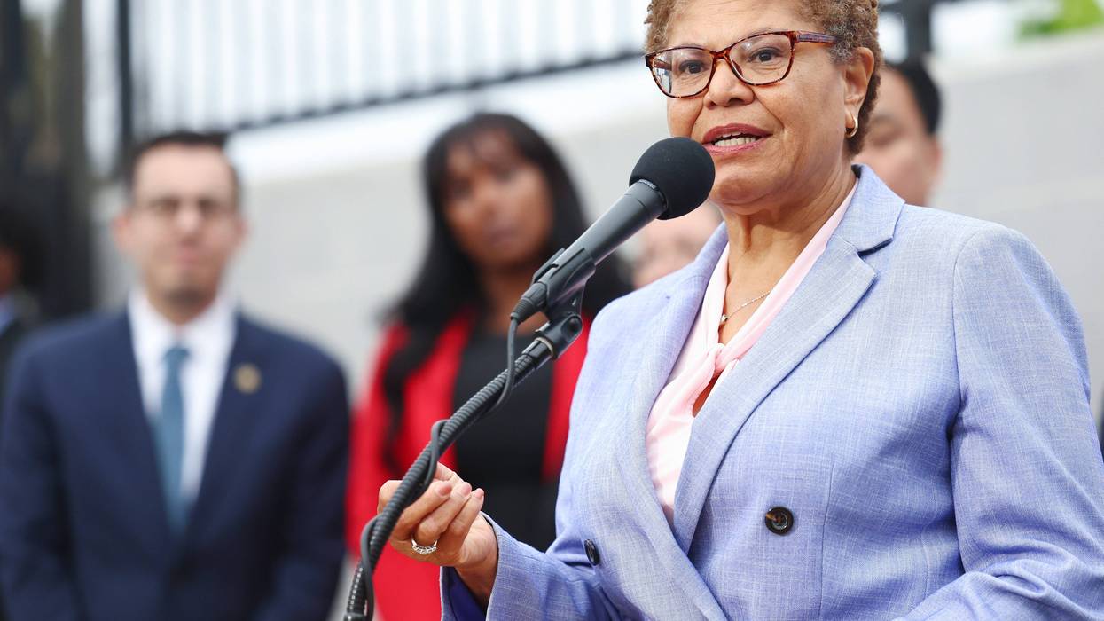 karen bass speaks at podium