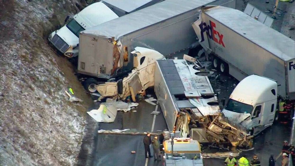 KDKA TV shows the scene near Greensburg, Pa. along the Pennsylvania Turnpike where five people were killed and dozens were injured in the crash that involved multiple vehicles. A preliminary report released by the National Transit Safety Board Thursday, F
