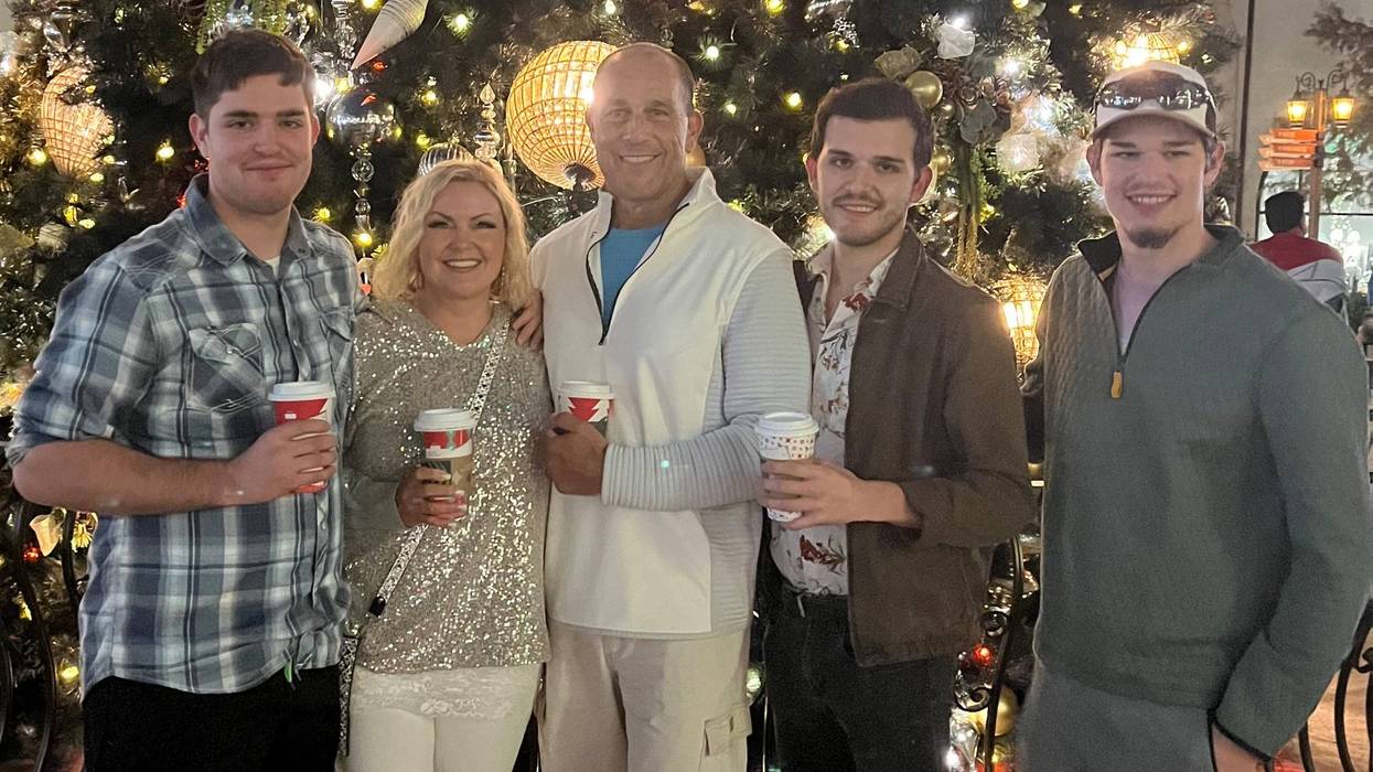 Keith Zafren, center, with his wife Lori and three sons.