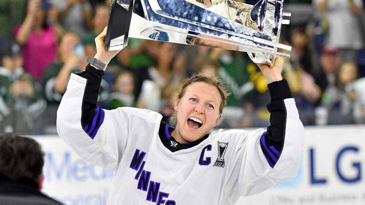 Kendall Coyne Schofield #26 of Minnesota raises the Walter Cup after the win over Boston during Game Five of the PWHL Finals at Tsongas Center on May 29, 2024 in Lowell, Massachusetts.