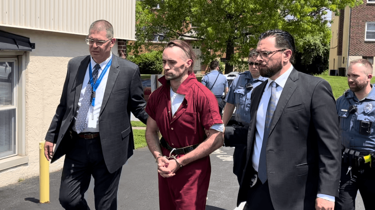 Kenneth Shea is escorted into the courthouse on May 7, 2024, where he was ordered to stand trial for the fatal stabbing of his estranged wife, Elizabeth Shea.
