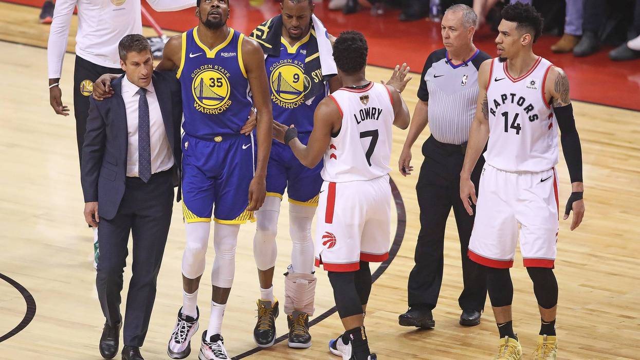Kevin Durant limps off the court in Game 5 of the NBA Finals.