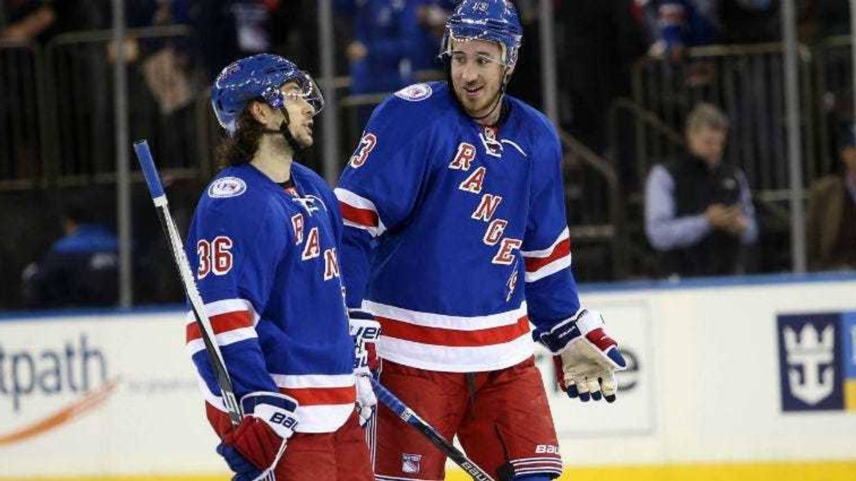 Kevin Hayes and Mats Zuccarello celebrate a 5-2 win over the Winnipeg Jets at Madison Square Garden.