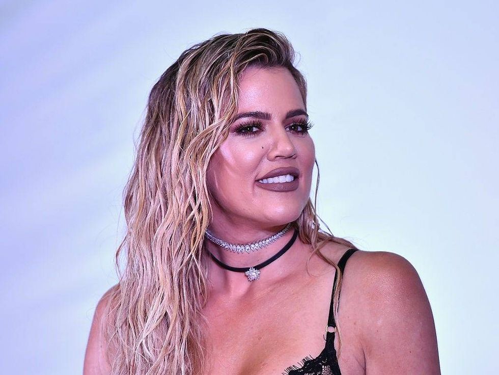 Khloé Kardashian, 37, stuns in skintight romper and snakeskin coat