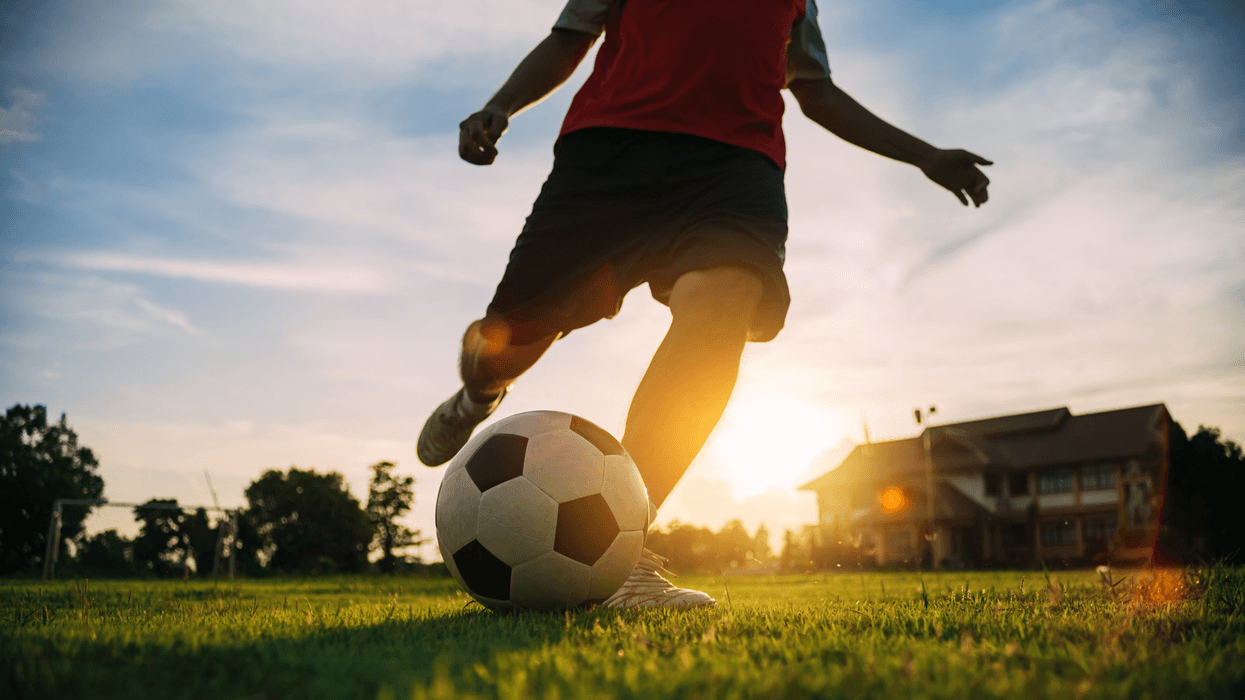 Kid playing soccer