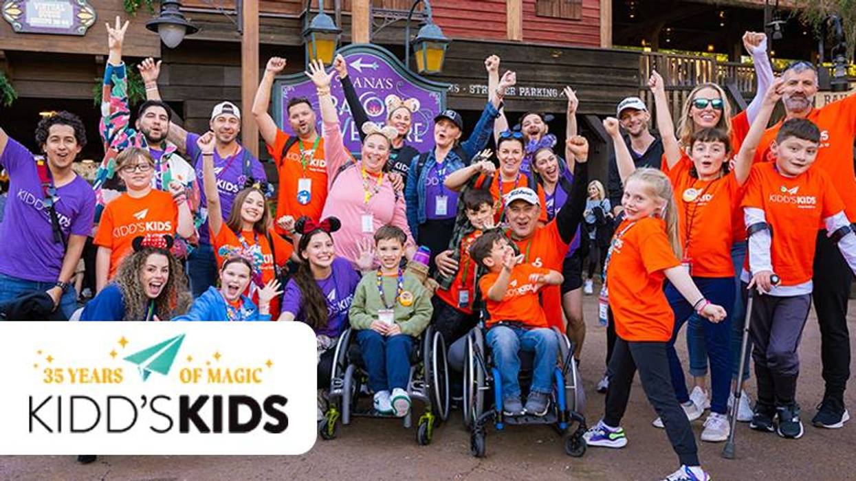 Kidd's Kids trip families and show members outisde of Tiana's Bayou Adventure ride