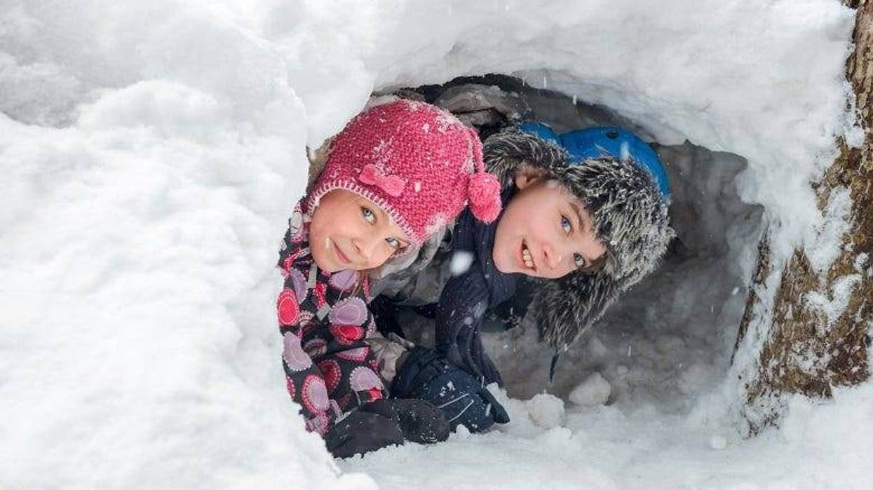 kids in a snow fort