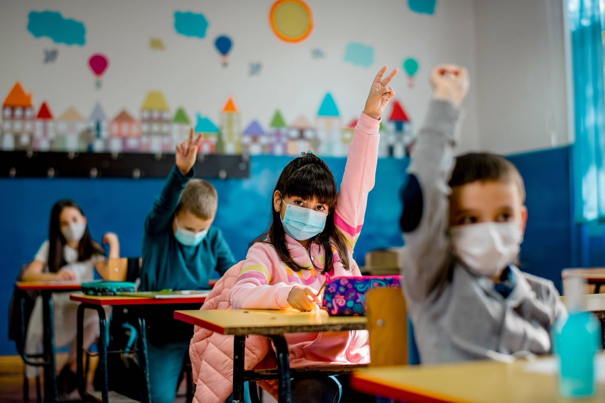 Kids in school wearing masks.