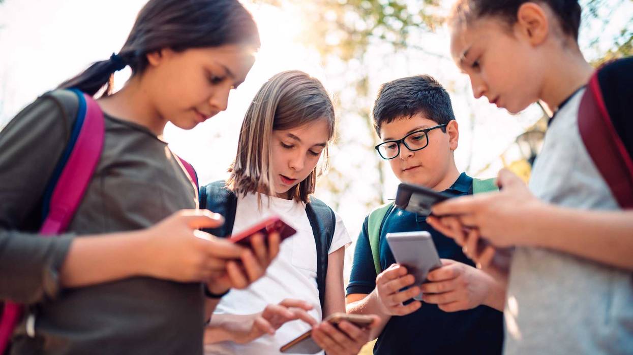 Kids on their cell phones