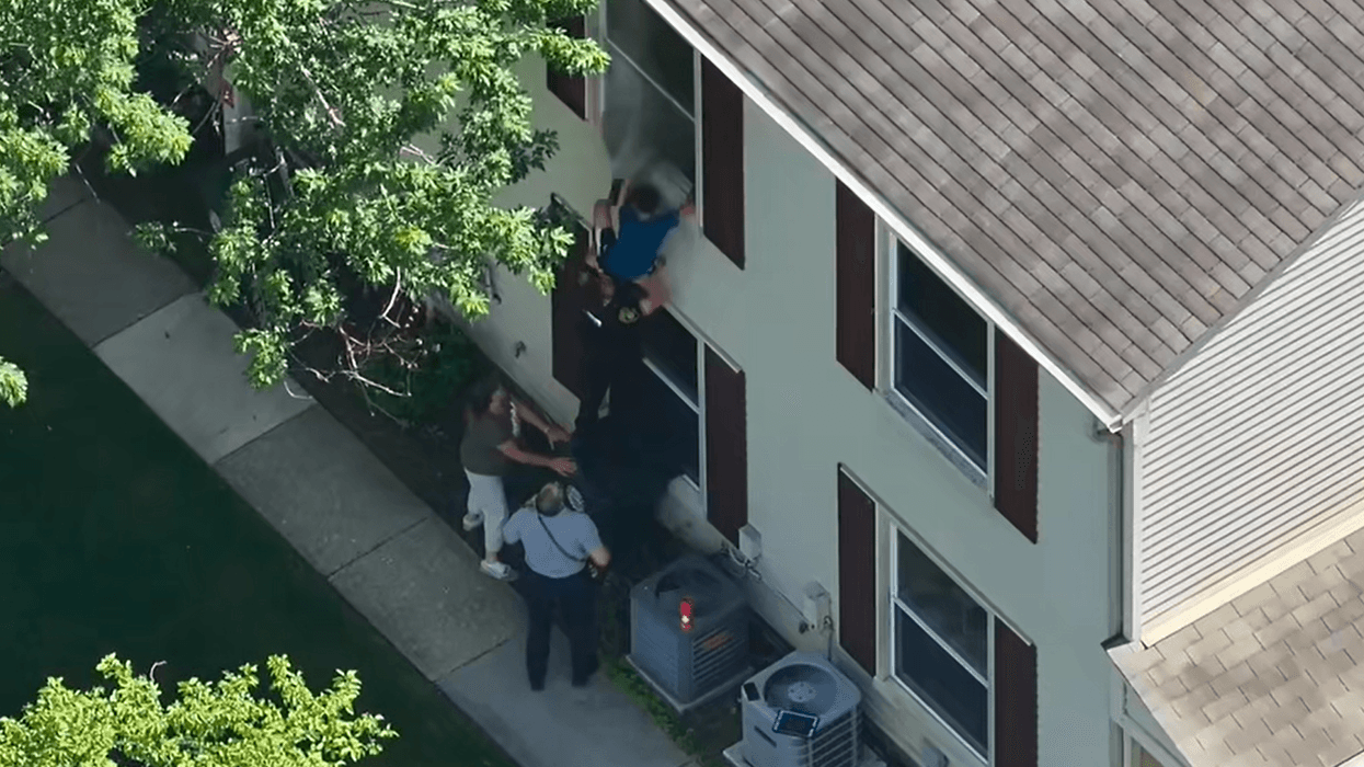 Quick-thinking deputy rescues 2 kids from window of burning Orion Twp. home
