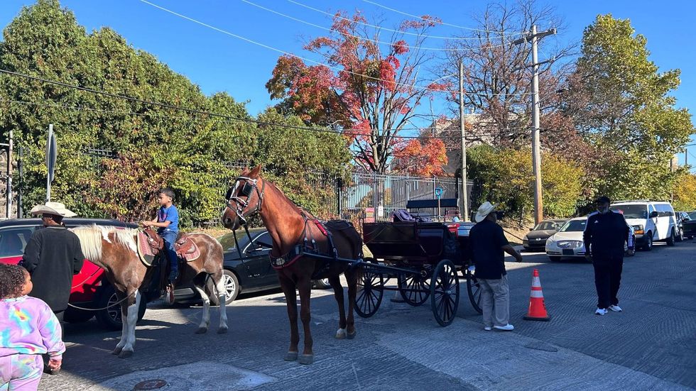 Kids ride horses at Saturday
