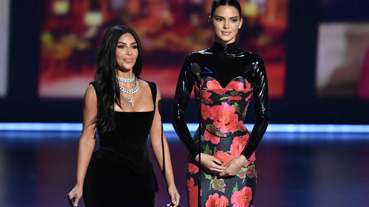 ; Kim Kardashian (L) and Kendall Jenner present the award for best competition program during the 71st Emmy Awards at the Microsoft Theater.