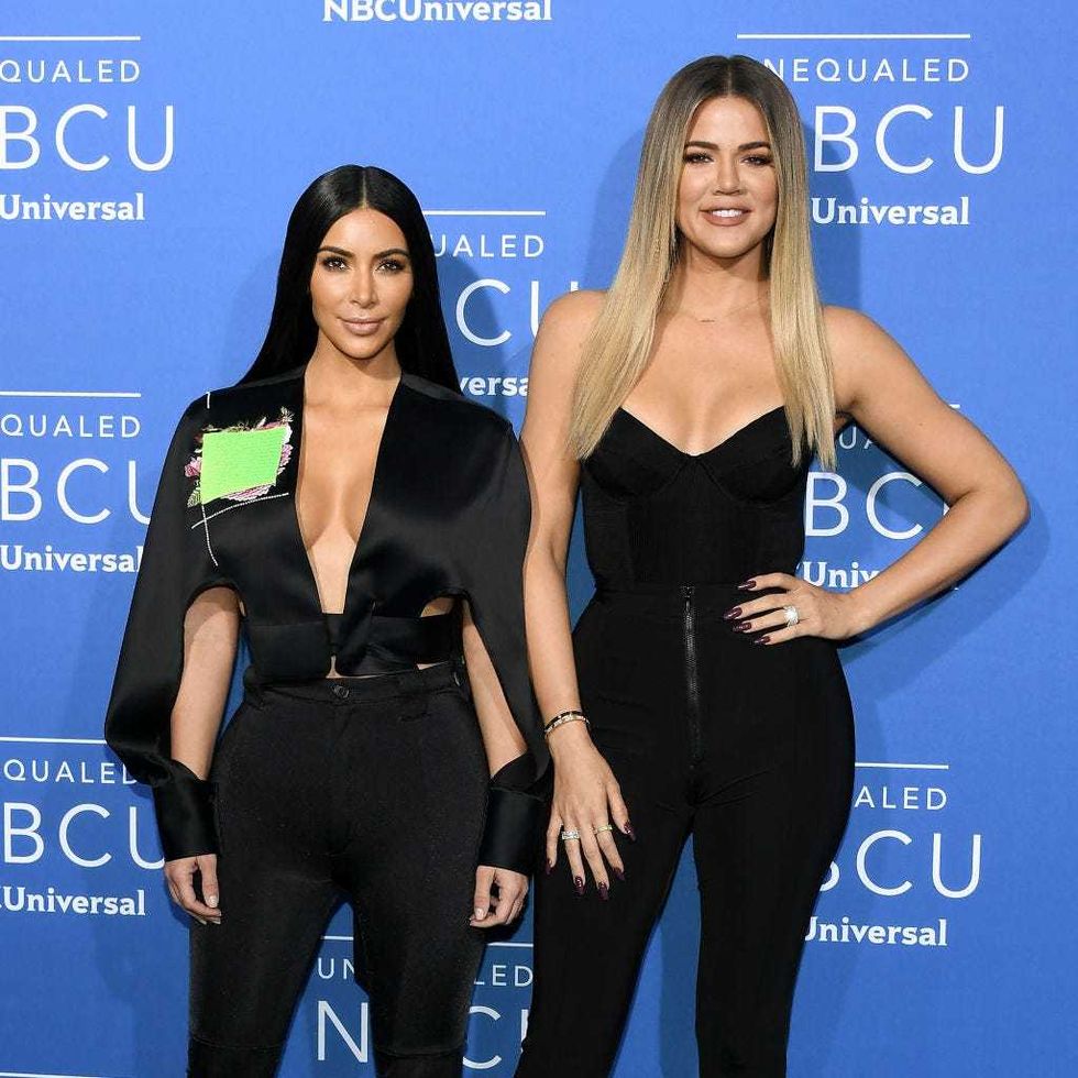 Kim and Khloe Kardashian go twinning in black bikinis during tropical getaway