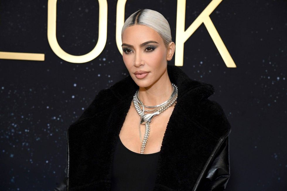 Kim Kardashian goes goth in lacy see-through gown