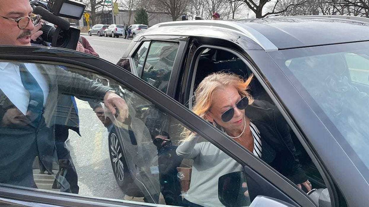 Kimberly Sullivan gets into a waiting car following a hearing Wednesday in Waterbury Superior Court, Waterbury, Connecticut.
