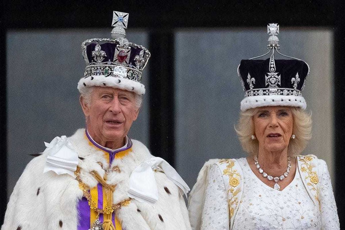 King Charles III and Queen Camilla are seen on the Buckingham Palace balcony during the flypast during the Coronation of King Charles III and Queen Camilla on May 06, 2023 in London, England. The Coronation of Charles III and his wife, Camilla, as King and Queen of the United Kingdom of Great Britain and Northern Ireland, and the other Commonwealth realms takes place at Westminster Abbey today. Charles acceded to the throne on 8 September 2022, upon the death of his mother, Elizabeth II. (Photo by Christopher Furlong/Getty Images)