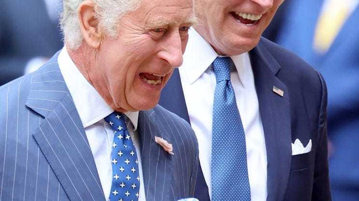 King Charles III greets The President of the United States, Joe Biden in the Quadrangle at Windsor Castle as part of a ceremonial welcome on July 10, 2023 in Windsor, England. The President is visiting the UK to further strengthen the close relationship between the two nations and to discuss climate issues with King Charles III. (Photo by Chris Jackson/Getty Images)