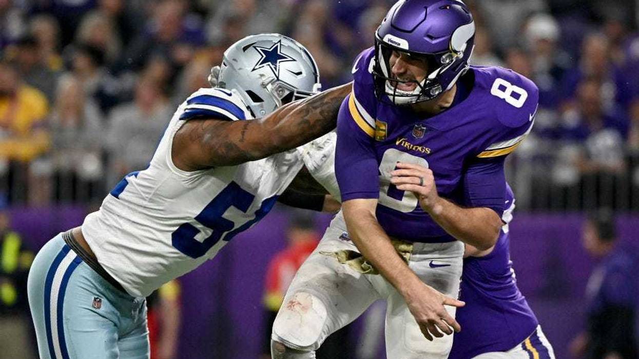 Kirk Cousins #8 of the Minnesota Vikings in action against the Dallas Cowboys during the second half at U.S. Bank Stadium on November 20, 2022 in Minneapolis, Minnesota.