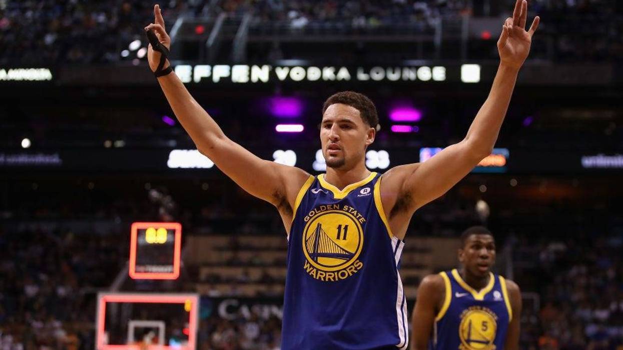 Klay Thompson #11 of the Golden State Warriors reacts during the first half of the NBA game against the Phoenix Suns at Talking Stick Resort Arena on April 8, 2018 in Phoenix, Arizona.