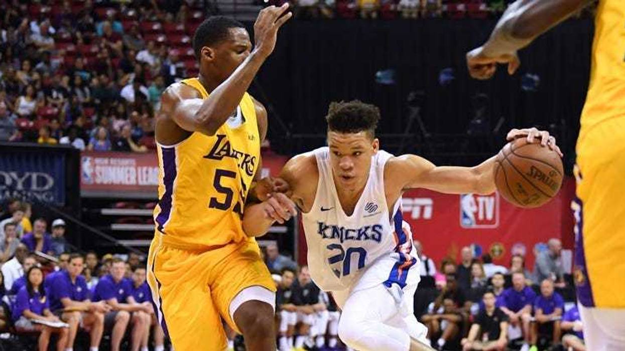 Knicks forward Kevin Knox (20) dribbles against the Lakers' Nick King during a Summer League game on July 10, 2018, at the Thomas & Mack Center in Las Vegas.