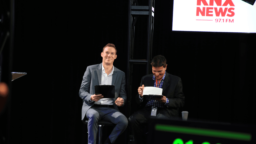 KNX News anchor Mike Simpson (L) and chief correspondent Charles Feldman (R)