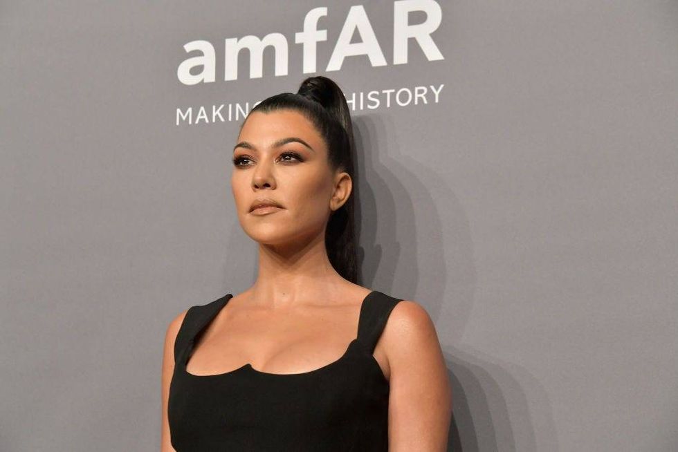 Kourtney Kardashian stuns in a sizzling black crop top while referencing famous ‘KUWTK’ phrase