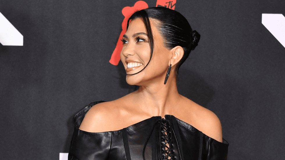 Kourtney Kardashian is the hot latex devil that this Halloween deserves