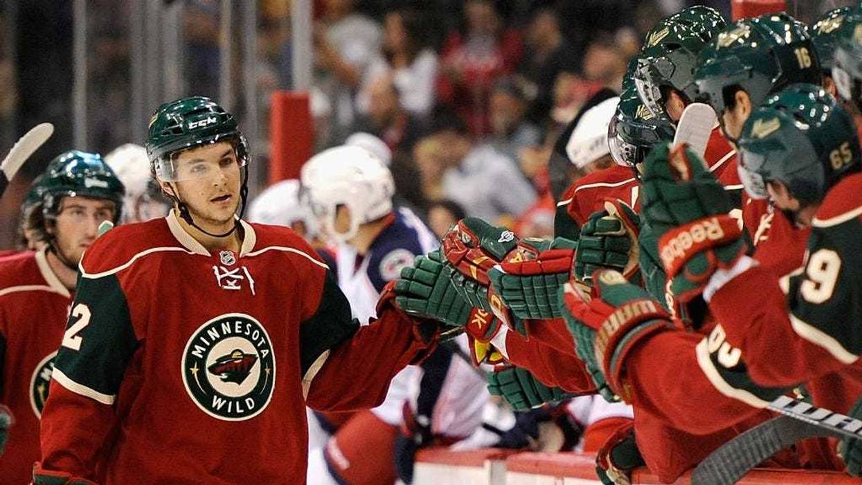 Kris Foucault #72 of the Minnesota Wild celebrates scoring a goal in the first period against the Columbus Blue Jackets in a preseason game on September 23, 2011 at Xcel Energy Center in Minneapolis, Minnesota.