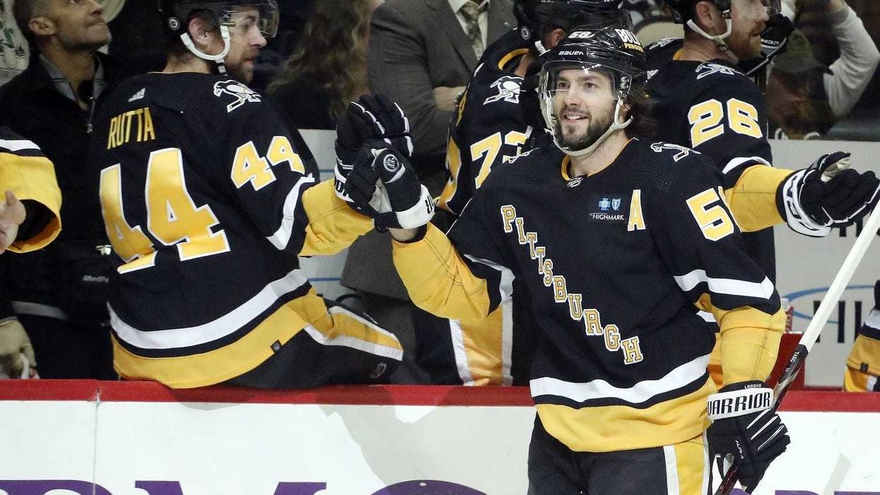 Kris Letang celebrates after scoring