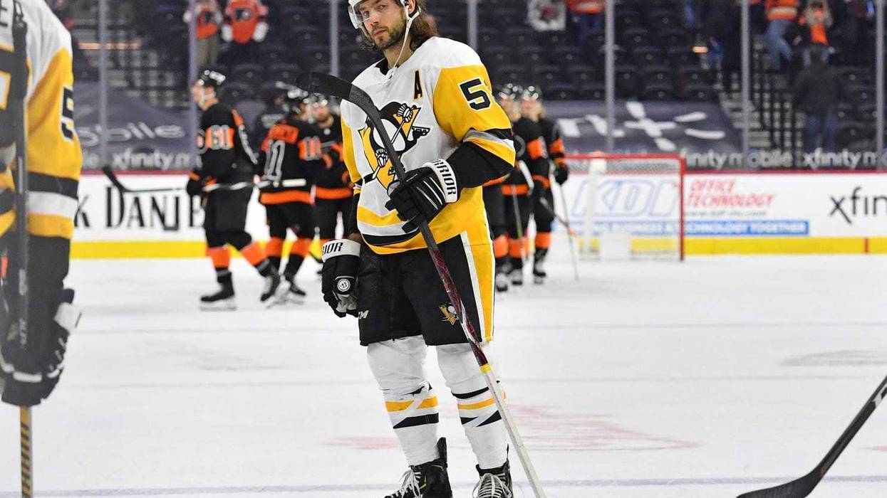 Kris Letang on ice looking dejected