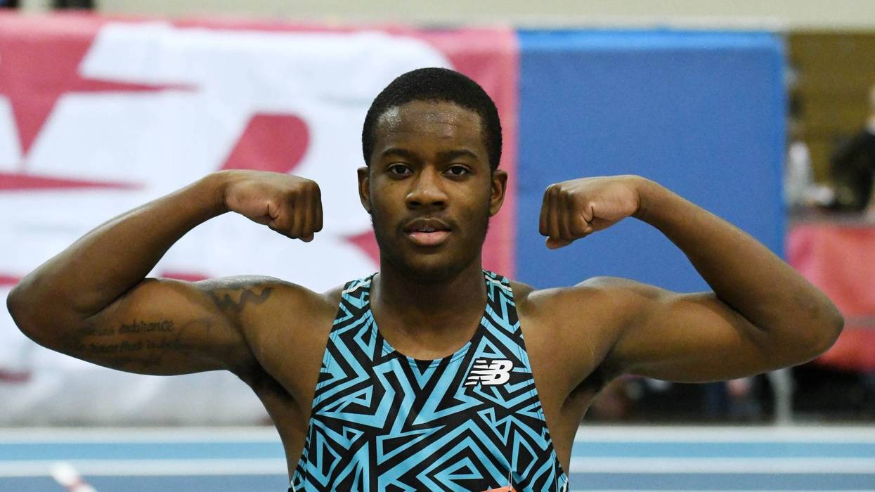 Kristian Marche flexes his biceps after winning the junior boys 60m during the New Balance Indoor Grand Prix at Reggie Lewis Center.