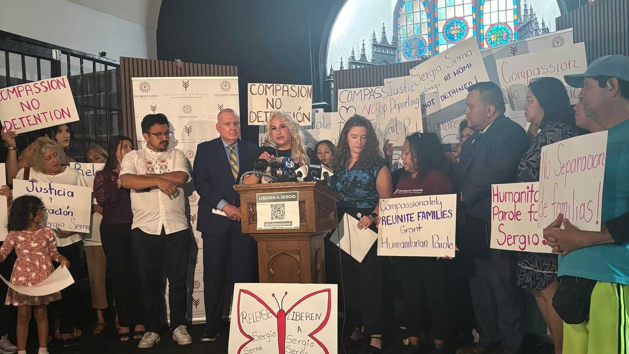 Kristina Ramirez, surrounded by community members