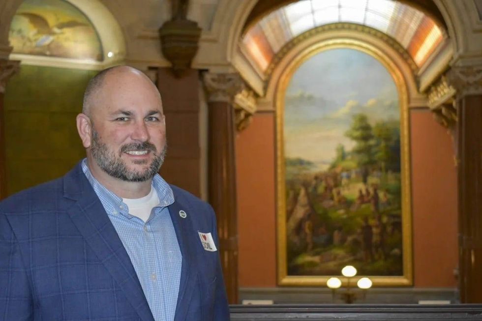 Kristopher Reynolds, Midwest director for American Farmland Trust and a fifth-generation farmer in Nokomis, is pictured at the Illinois State Capitol on March 12, 2025. He works with farmers and landowners on conservation cropping practices to meet the goals of Illinois