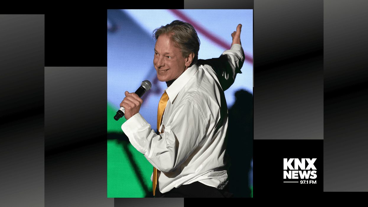 KROQ DJ Jed the Fish speaks onstage during day two of the 25th annual KROQ Almost Acoustic Christmas at The Forum on December 13, 2014 in Inglewood, California.