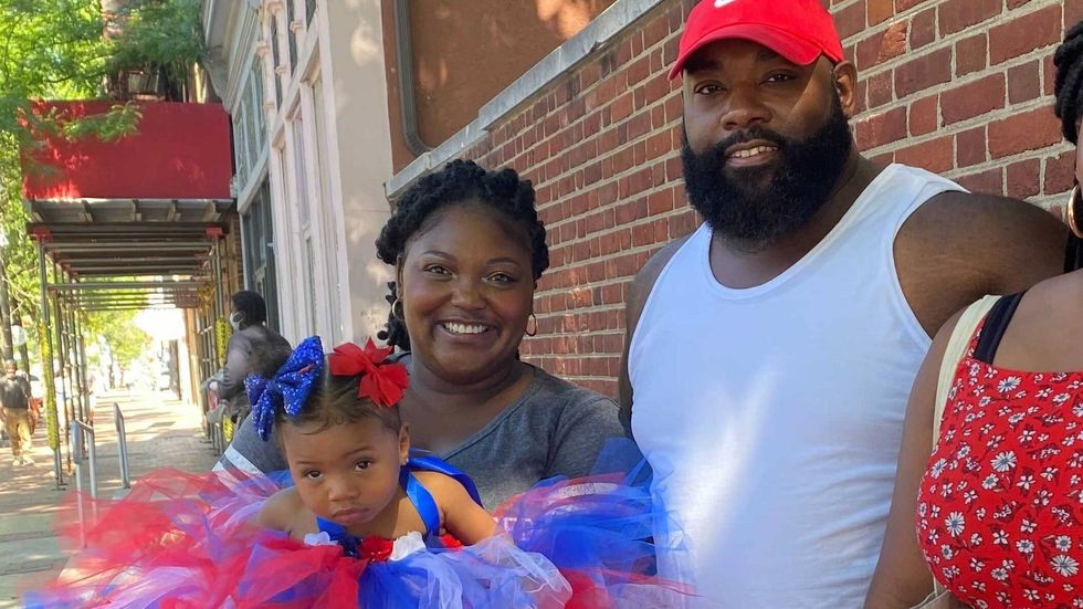 Kyla and Isaac Freeman supporting daughter Cami, who danced in the Philadelphia Independence Day parade Monday on Market Street.