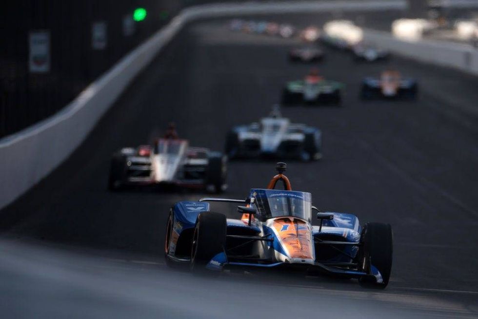 Kyle Larson, driver of the #17 Hendrickcars.com Arrow McLaren, leads a pack of cars during the 108th Running of the Indianapolis 500 at Indianapolis Motor Speedway on May 26, 2024 in Indianapolis, Indiana.