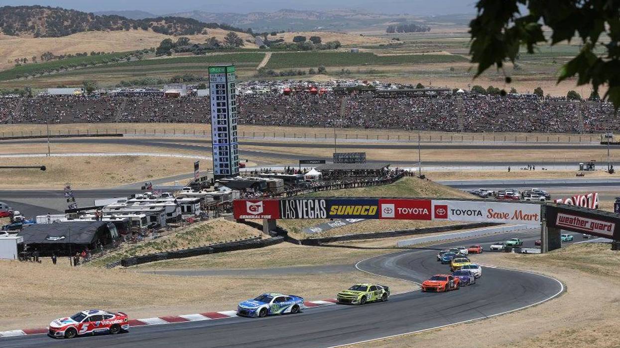 Kyle Larson, driver of the #5 Valvoline Chevrolet, leads the field during the NASCAR Cup Series Toyota/Save Mart 350 at Sonoma Raceway on June 09, 2024 in Sonoma, California.
