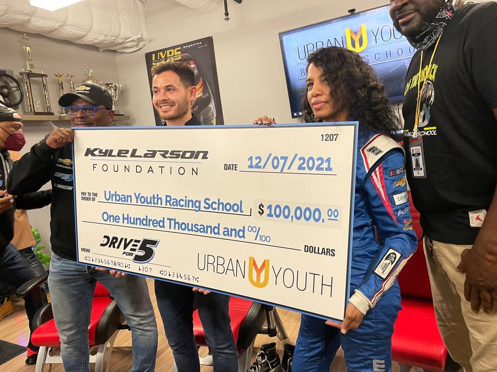 Kyle Larson (second from left).