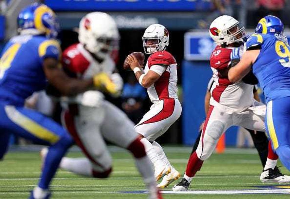 Kyler Murray drops back to pass