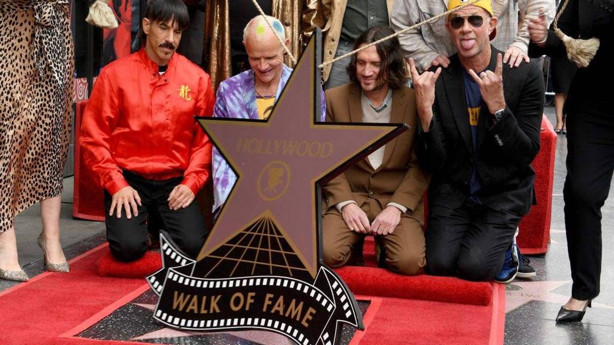 (L-R) Anthony Kiedis, Flea, John Frusciante and Chad Smith of The Red Hot Chili Peppers attend the Hollywood Walk of Fame Star Ceremony for The Red Hot Chili Peppers on March 31, 2022 in Hollywood, California.