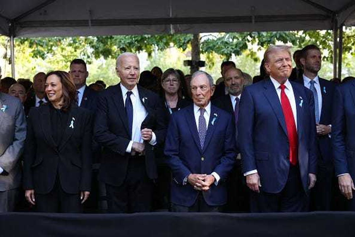 (L-R) Democratic presidential nominee, U.S. Vice President Kamala Harris, U.S. President Joe Biden, former Mayor of New York Michael Bloomberg, Republican presidential nominee, former U.S. President Donald Trump joined family and friends at Ground Zero honoring the lives of those lost on the 23rd anniversary of the terror attacks of September 11, 2001, at the World Trade Center on September 11, 2024 in New York City.