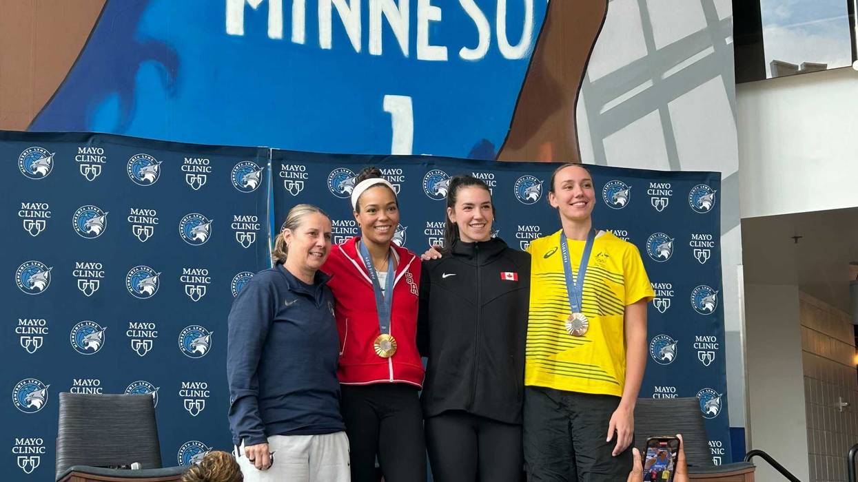 L-R: Head Coach Cheryl Reeve, Team USA's Napheesa Collier, Canada's Bridget Carleton and Alanna Smith of Australia.