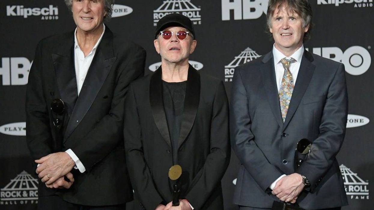 (L-R) Inductees John Illsley, Alan Clark and Guy Fletcher of Dire Straits attend the 33rd Annual Rock & Roll Hall of Fame Induction Ceremony at Public Auditorium on April 14, 2018.