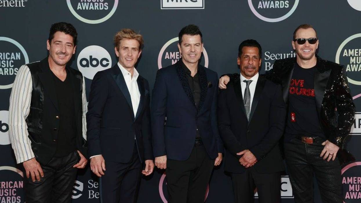 (L-R) Jonathan Knight, Joey McIntyre, Jordan Knight, Danny Wood, and Donnie Wahlberg of New Kids on the Block attend the 2021 American Music Awards at Microsoft Theater on November 21, 2021 in Los Angeles, California.