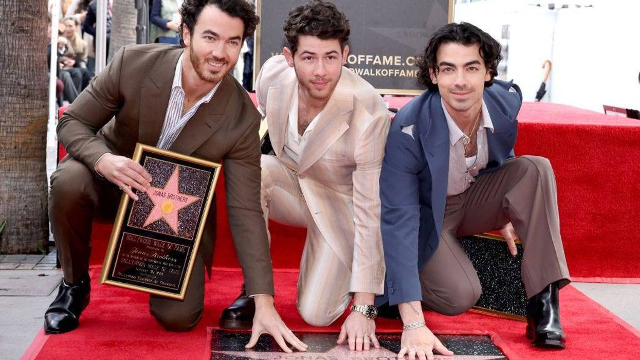 (L-R) Kevin Jonas, Nick Jonas, and Joe Jonas of The Jonas Brothers attend The Hollywood Walk of Fame star ceremony honoring The Jonas Brothers on January 30, 2023 in Hollywood, California.