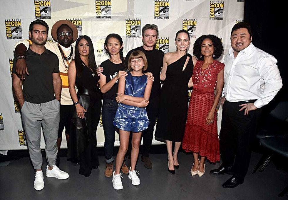 L-R) Kumail Nanjiani, Brian Tyree Henry, Salma Hayek, Director Chloe Zhao, Lia McHugh, Richard Madden, Angelina Jolie, Lauren Ridloff and Don Lee of Marvel Studios